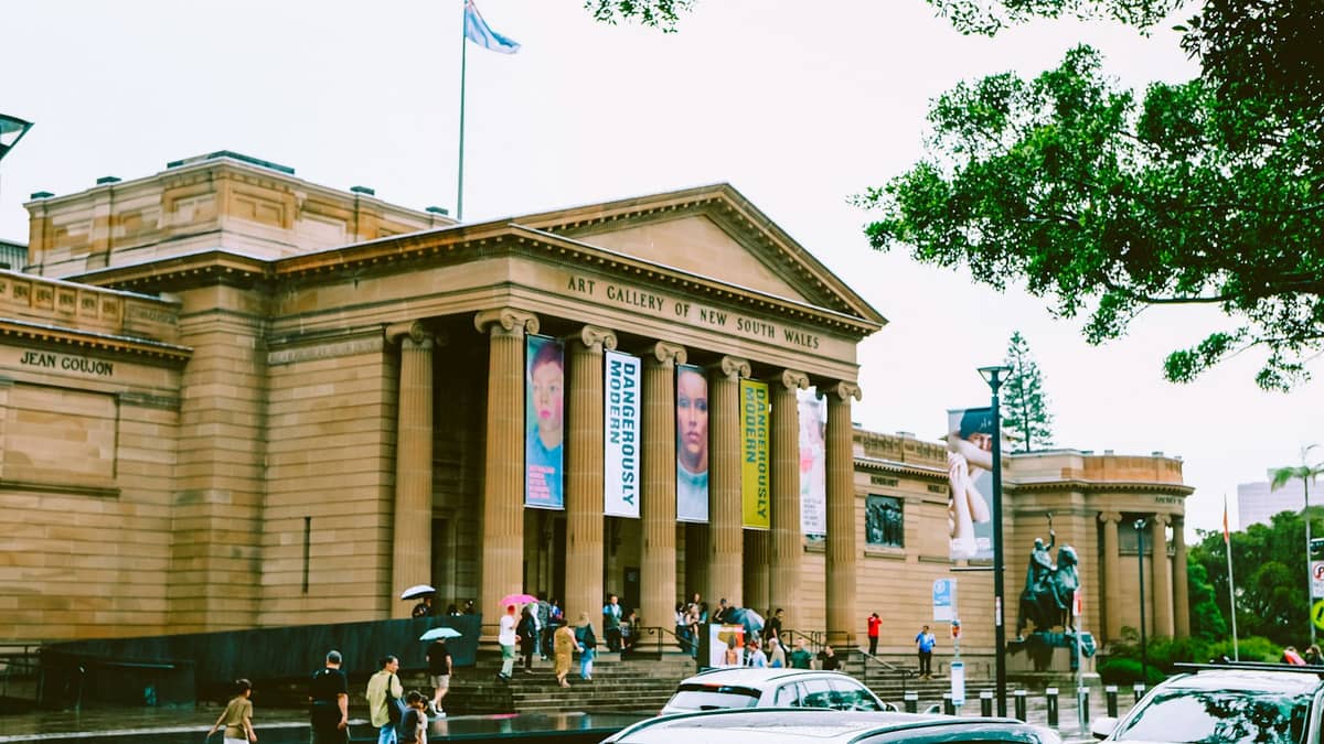 Crowds and banners outside the Art Gallery of New South Wales, a major Sydney museum for art and historic collections.