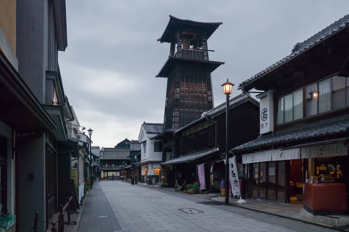 Traditional wooden clock tower and preserved historic street in Kawagoe, a renowned historic town near Tokyo.