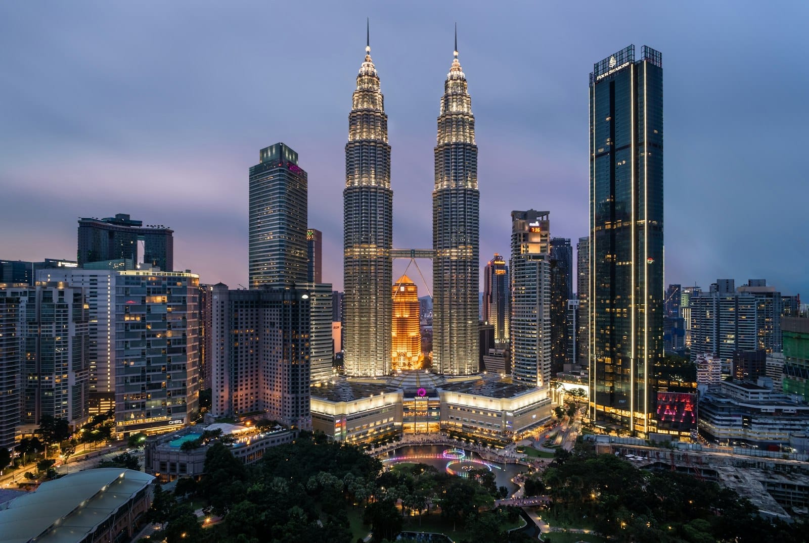 Petronas Twin Towers and KLCC skyline at dusk, Kuala Lumpur city center view