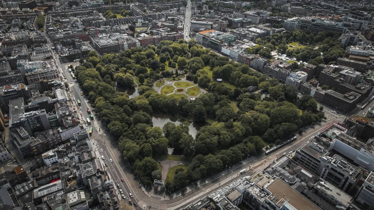 Aerial view of Dublin city centre showing St. Stephen's Green park surrounded by streets and buildings, illustrating the compactness of Dublin neighbourhoods.